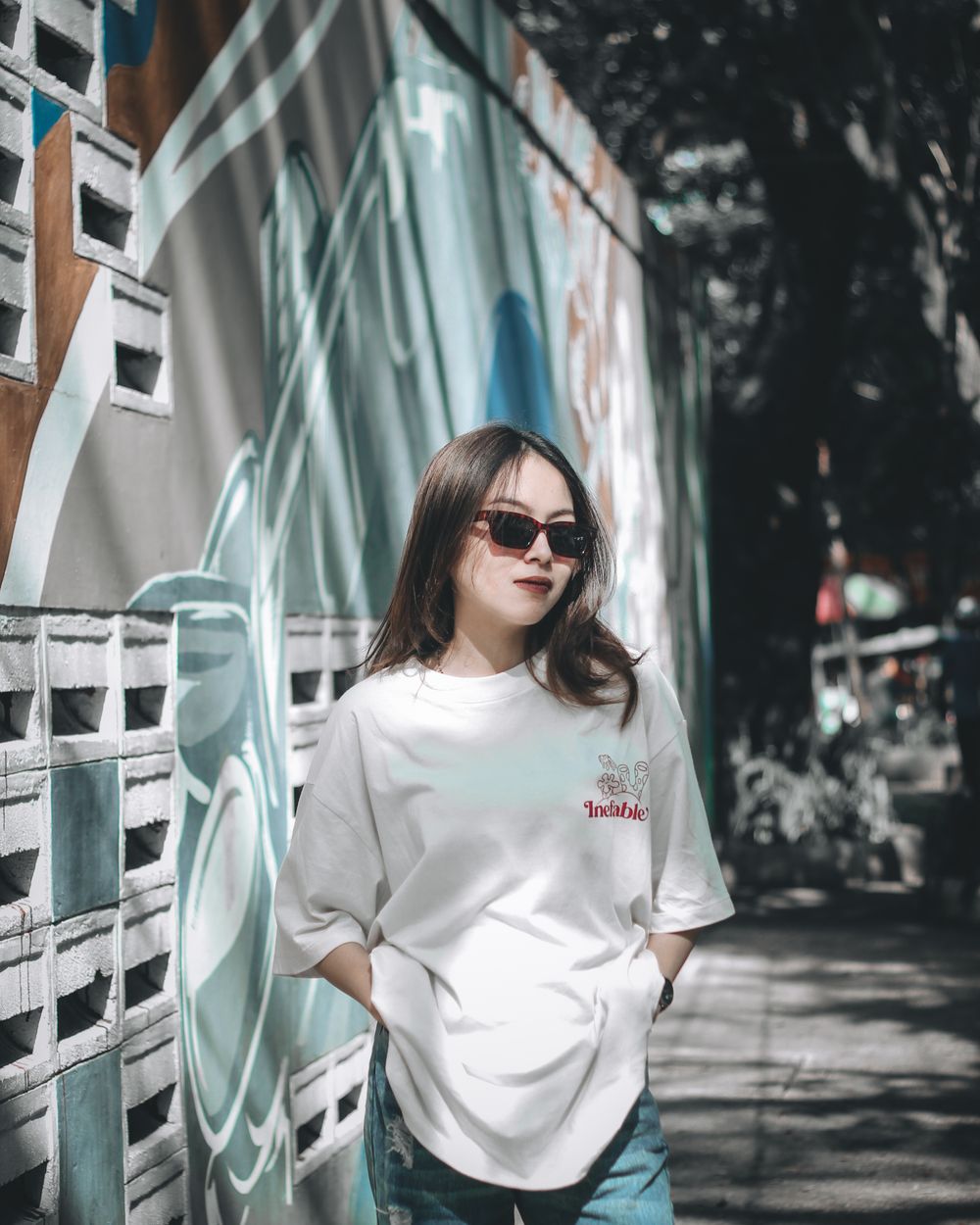 Model wearing the TD Bone Oversized Tee in off-white