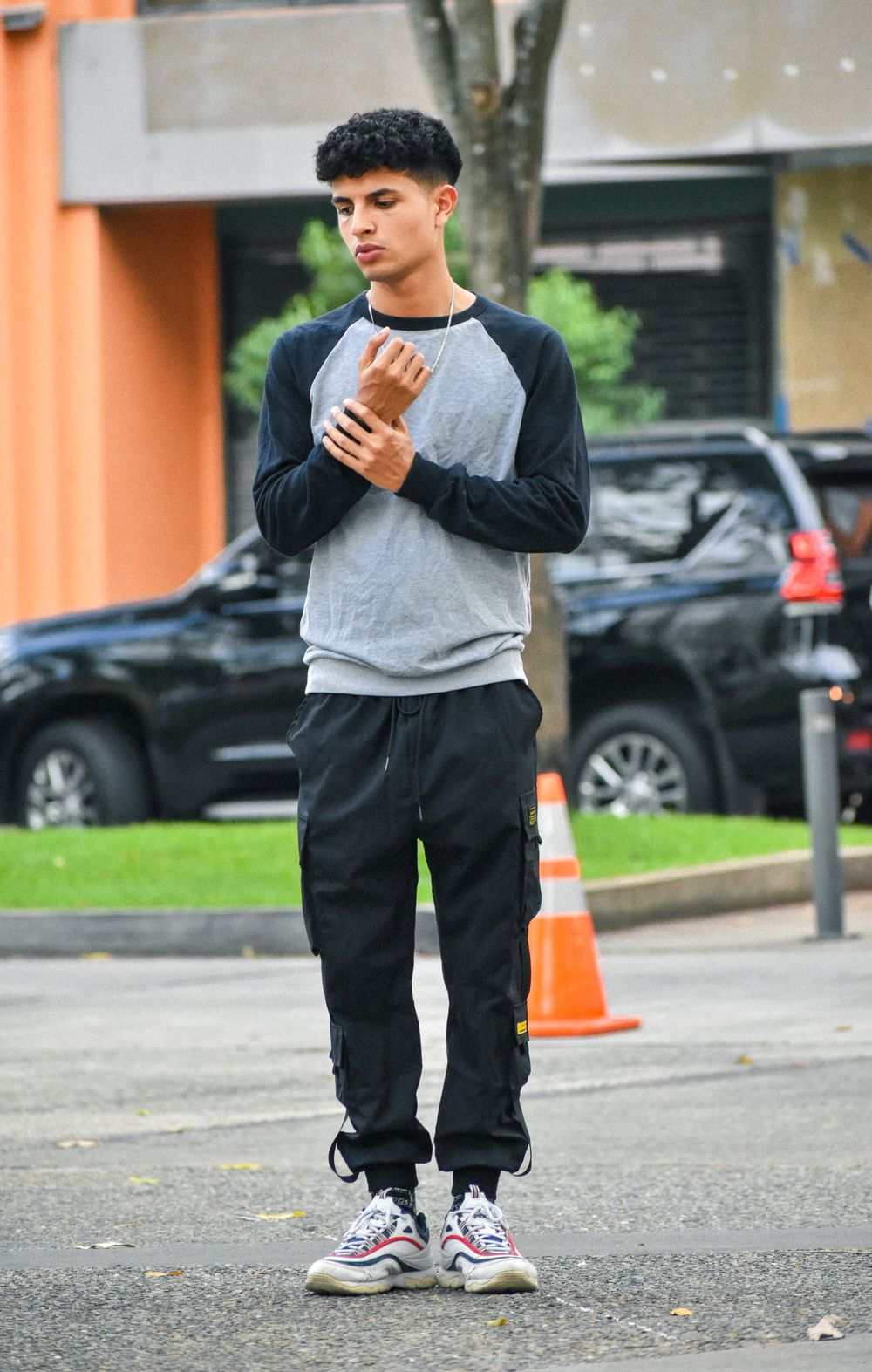 Model wearing the TD Contrast Crewneck, full length view