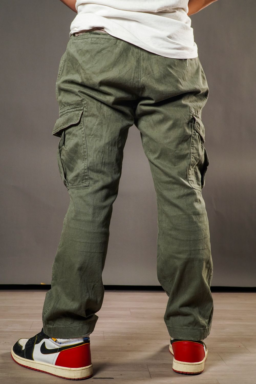 Model wearing the TD Utility Cargo Trouser in olive